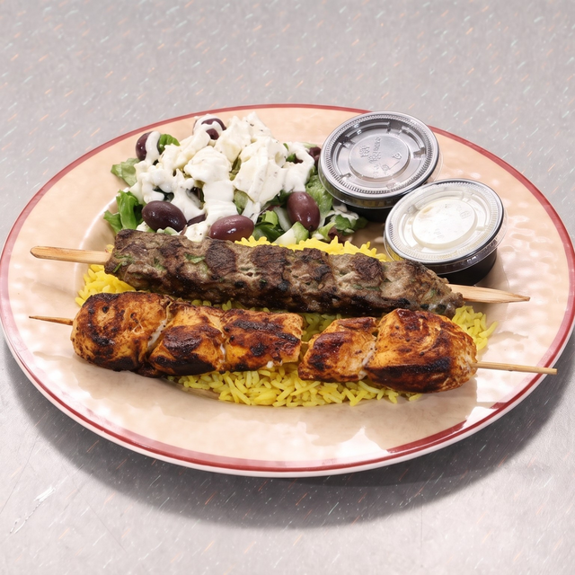 Chicken Kabob & Lamb Kabob Mix Combo Over Rice.